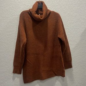 Womens xs free people turtle neck sweater. Rust / orange color